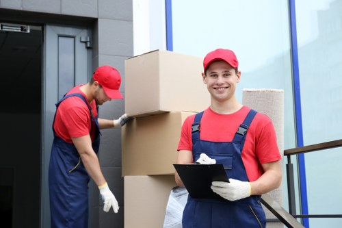 Careful lifting of furniture during a Tooting house move