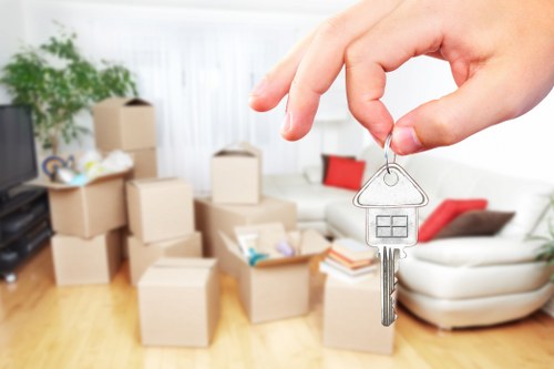 Team planning a larger house move with furniture and storage items