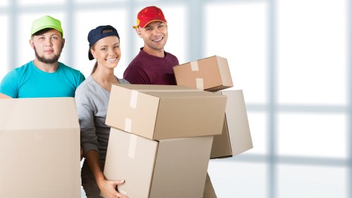 Careful loading of household items for flat removals in Tooting