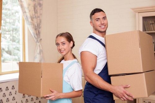 Careful handling of furniture during a house move in Tooting