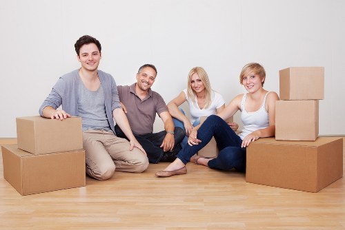 Packed office boxes and furniture ready for transport in South London